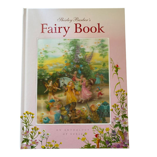 cover of Shirley Barbers the fairy book. The cover is a 3 D image of fairies riding a unicorn through a meadow and celebrating 