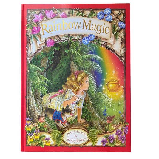 Cover mage of Rainbow Magic by Shirley Barber shows a young girl with blonde hair and a yellow dress and a small dog looking out from a tree at a pot of gold under a rainbow. Fairies, elves and beautiful flowers surround them