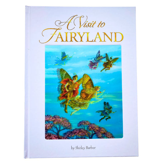 Front cover of the lenticular or 3D edition of  A Visit to Fairyland by Shirley Barber. The book is white with gold writing and their is a 3D image of a selection of fairies with butterfly wings flying over the tree tops
